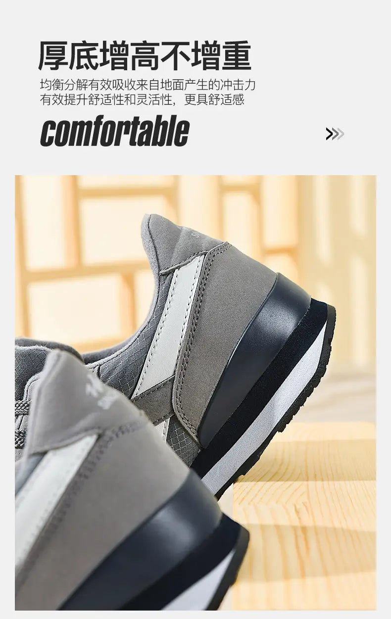 Herrenfreizeitsneaker in Grau und Weiß zum Gehen mit sportlichem Design in Grau und Weiß sowie einer dicken, gepolsterten Sohle für Komfort und Halt.
