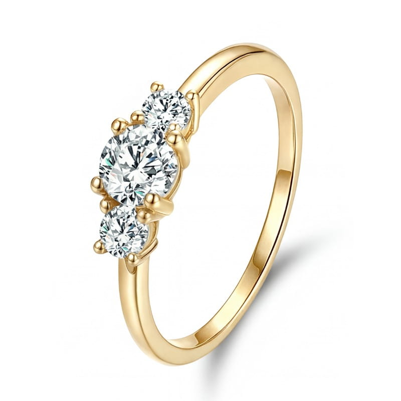 Sterling silver zircon ring for women featuring a gold three-stone diamond design with round-cut stones set in a sleek polished band.