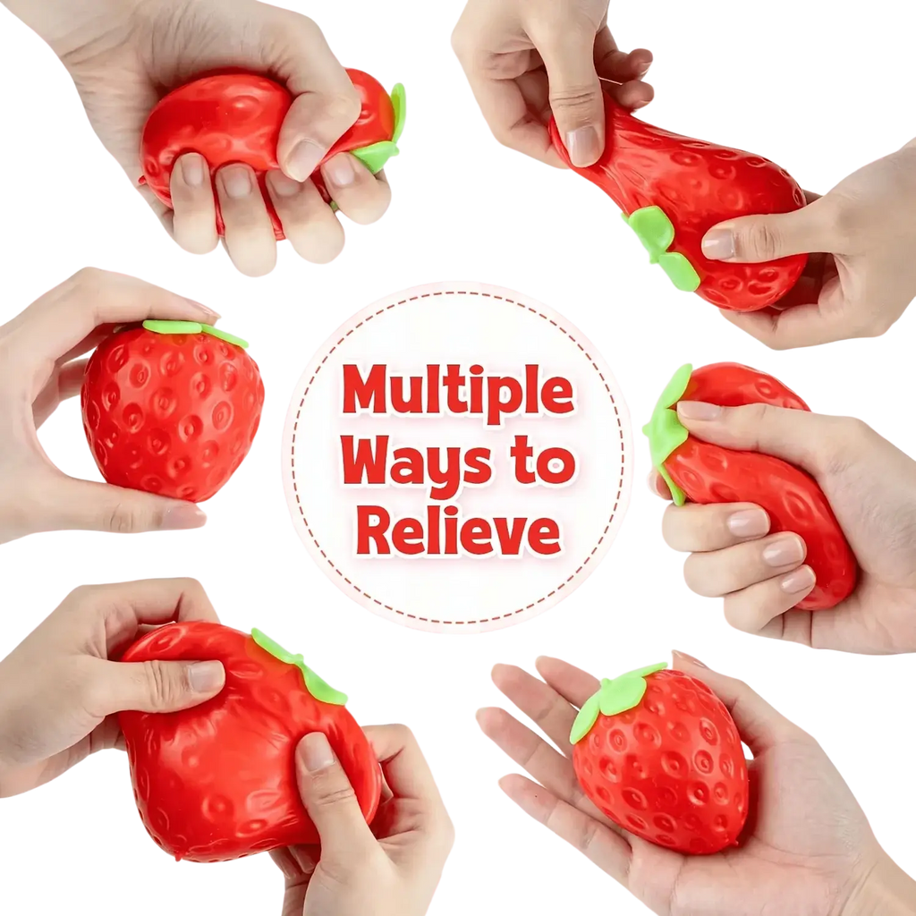 Red strawberry-shaped silicone cheese squishy toy with green leafy top designed as a sensory fidget item