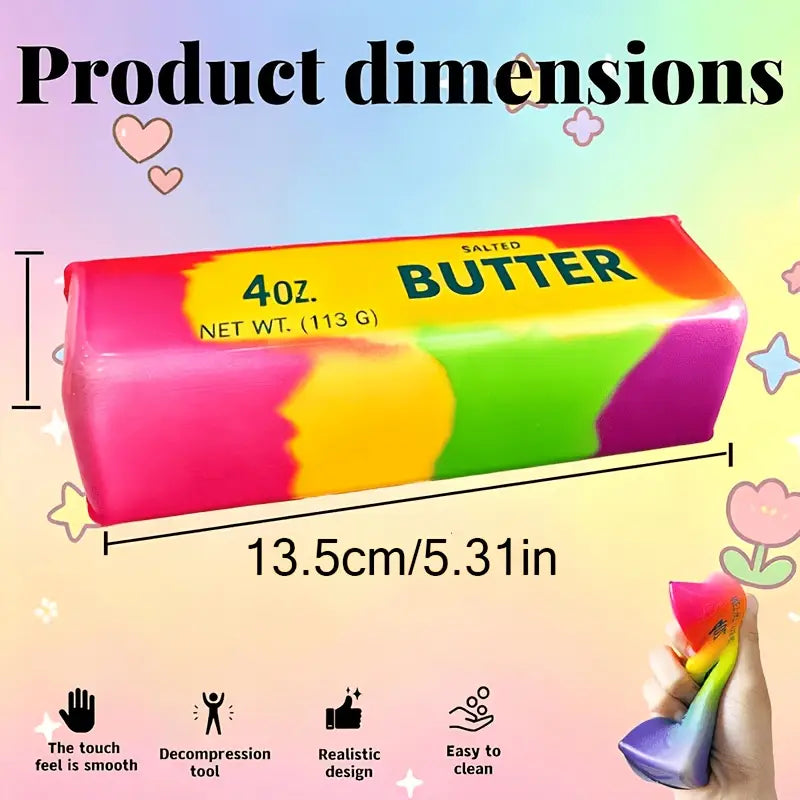 Rainbow butter squishy stress relief toy made of rainbow-colored squishy material shaped like butter with salted butter printed in green on a glossy surface.