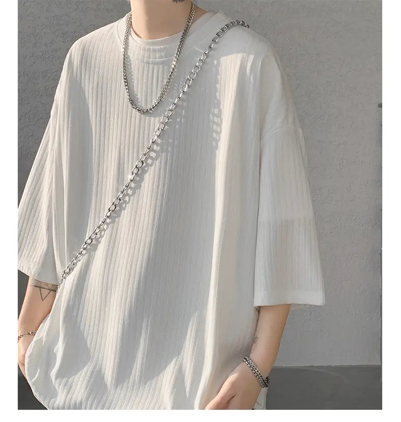 White ribbed cotton t-shirt with relaxed fit and three-quarter sleeves featured as men striped oversized summer tshirt.