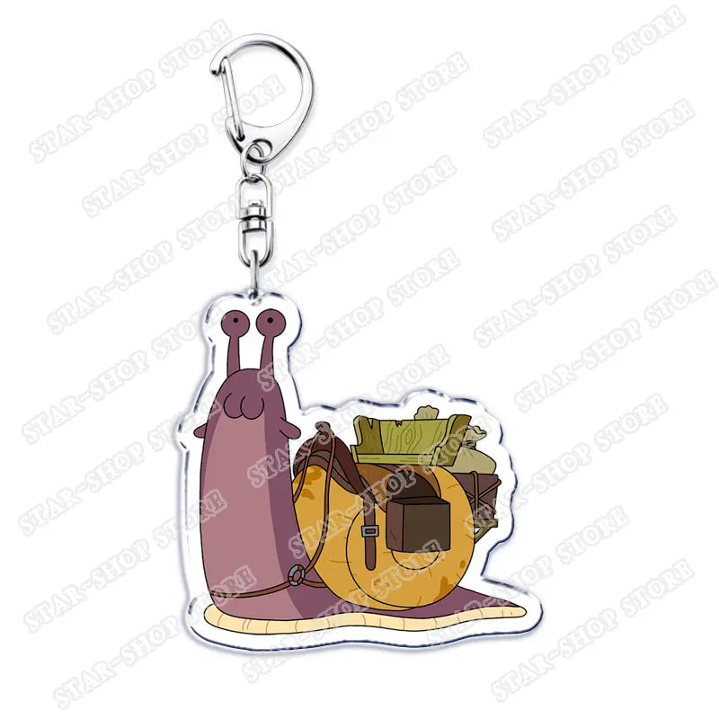 A purple cartoon snail with a yellow shell and green backpack on an acrylic keychain from the Amphibia Anime acrylic keychain cartoon keyring collection.