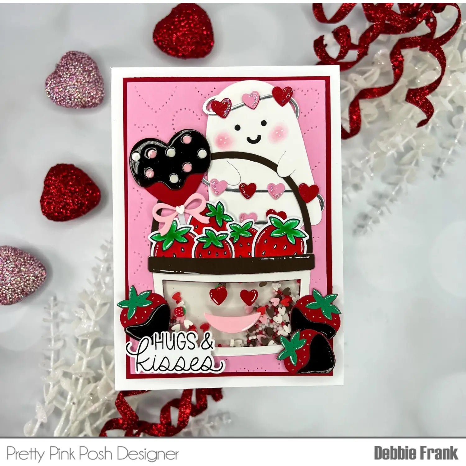 valentine metal cutting dies and clear stamps set featuring a charming pink valentine day card with a white ghost holding a basket of strawberries and glittery red and pink hearts