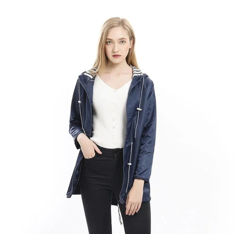 Women's Lightweight Waterproof Raincoat Ideal for Casual Outdoor Hikes Trench Style with Drawstring