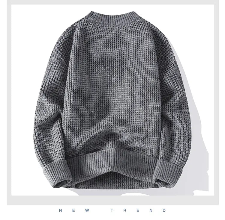 Moownuc Herren-Waffelstrick-Pullover im lässigen Stil in grauem Strick mit einem strukturierten Waffelmuster und gerippten Bündchen.