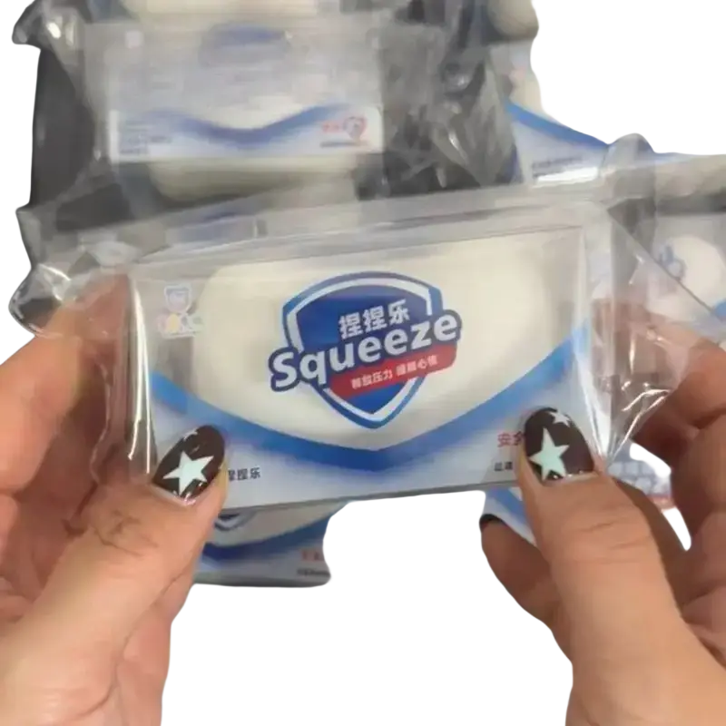 White and blue packaged soap squishy toy wet wipes with shield logo for stress relief and sensory fidget use