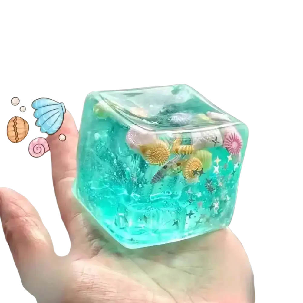 A translucent turquoise resin fidget cube filled with colorful seashells starfish and glitter as a thoughtful gift