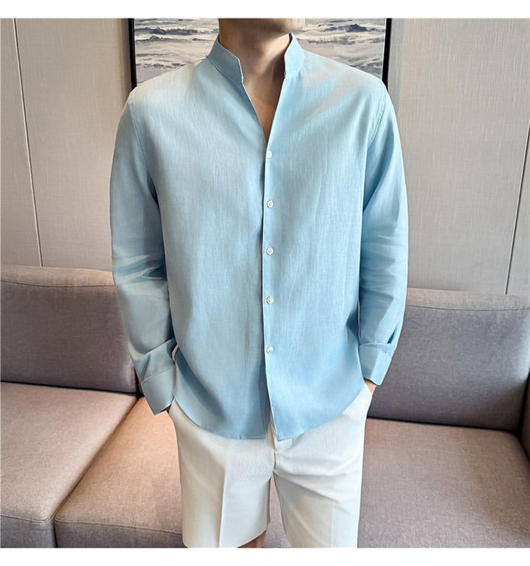 A light blue men’s linen long-sleeved button-up shirt with a mandarin collar and subtle texture.