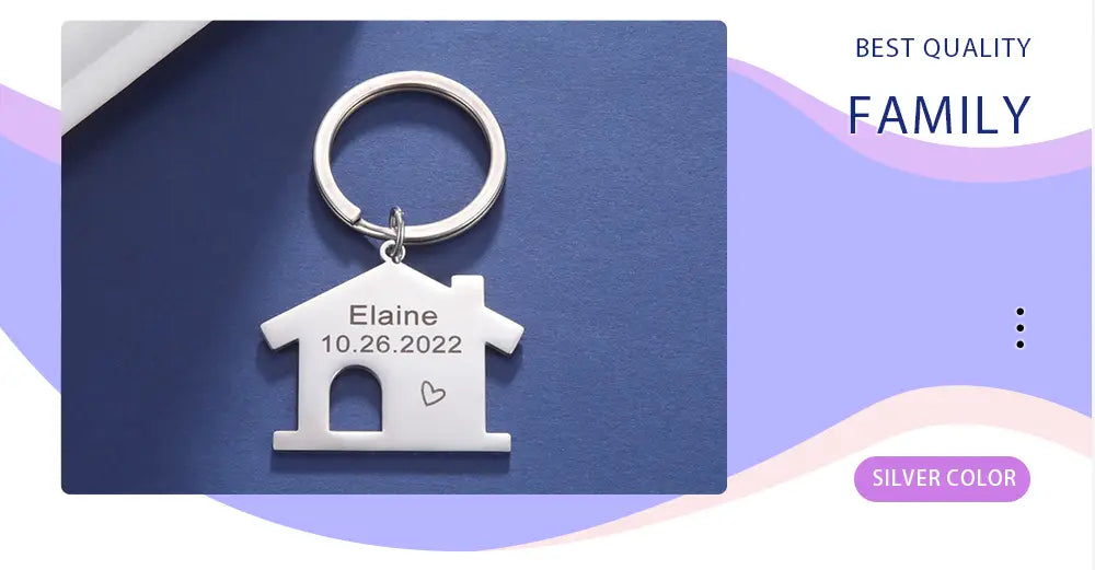 Silver house shaped keychain made of metal with engraved name and date as a personalized couple gift
