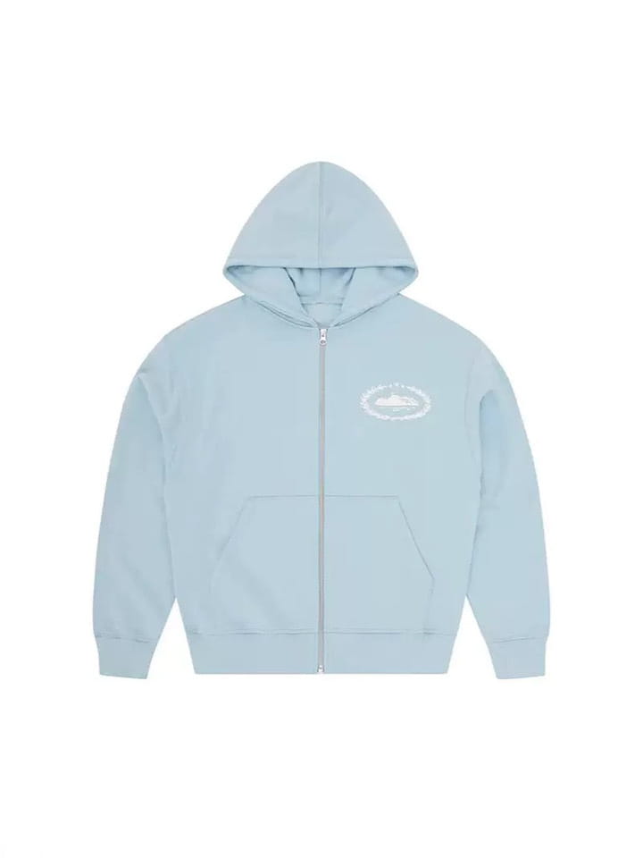 Homme Betawoo sweat à capuche zippé en polaire bleu clair, avec un logo brodé blanc discret sur la poitrine.
