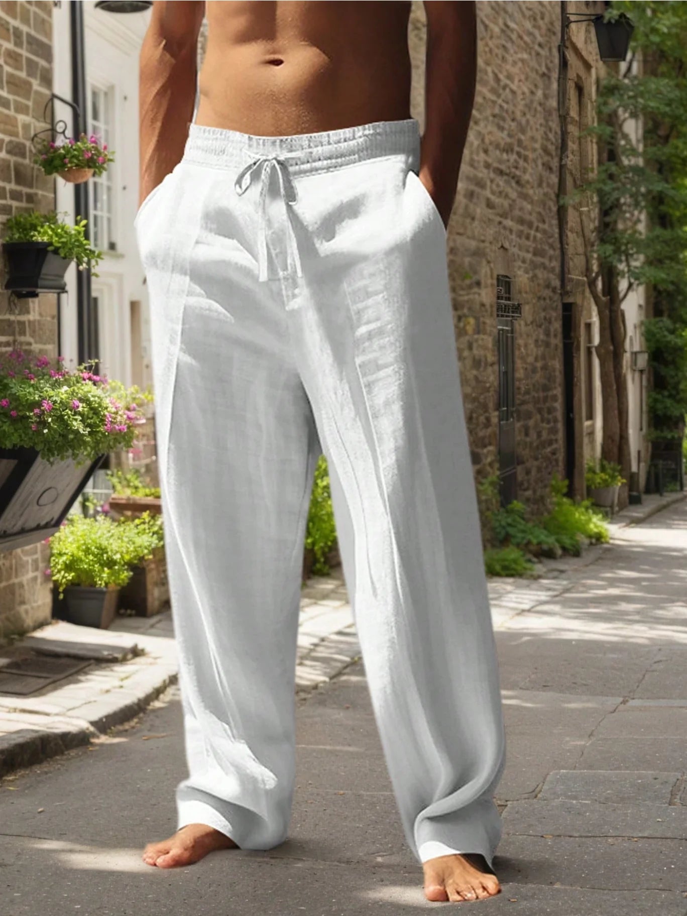 Weiße, lockere Herren-Casual-Beachhosen aus Baumwolle und Hanf mit elastischem Bund und Kordelzug.