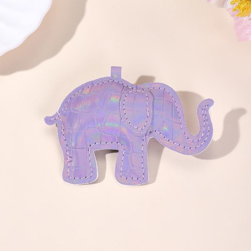 A lavender holographic pu leather elephant keychain with stitched detailing and a small loop for diy animal charm use.