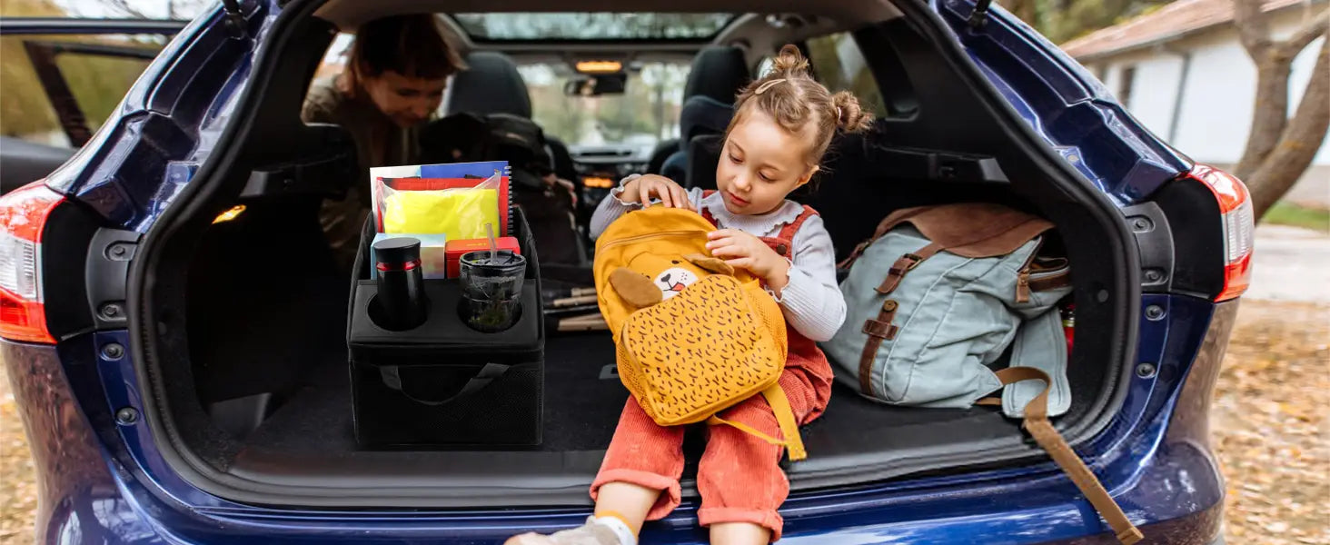 Bolsa organizadora plegable para el maletero del coche, de tejido amarillo, estilo mochila, con un pequeño rostro bordado y correas de cuero marrón