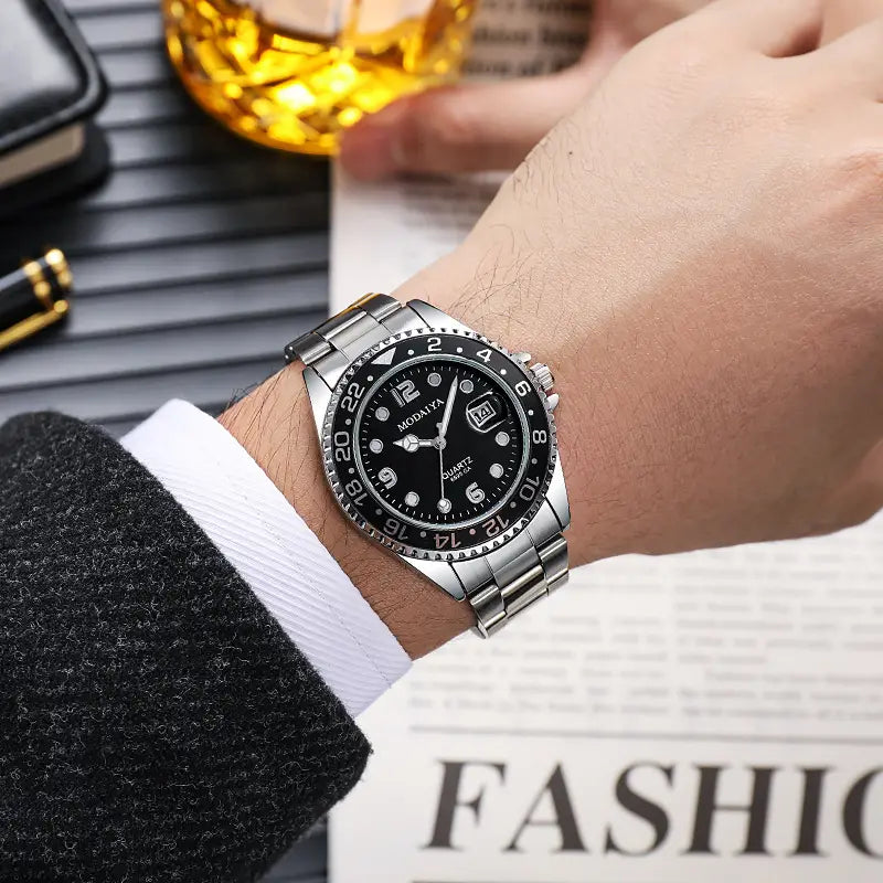 Silver stainless steel men’s quartz sport watch with black dial, date display, and rubber strap.
