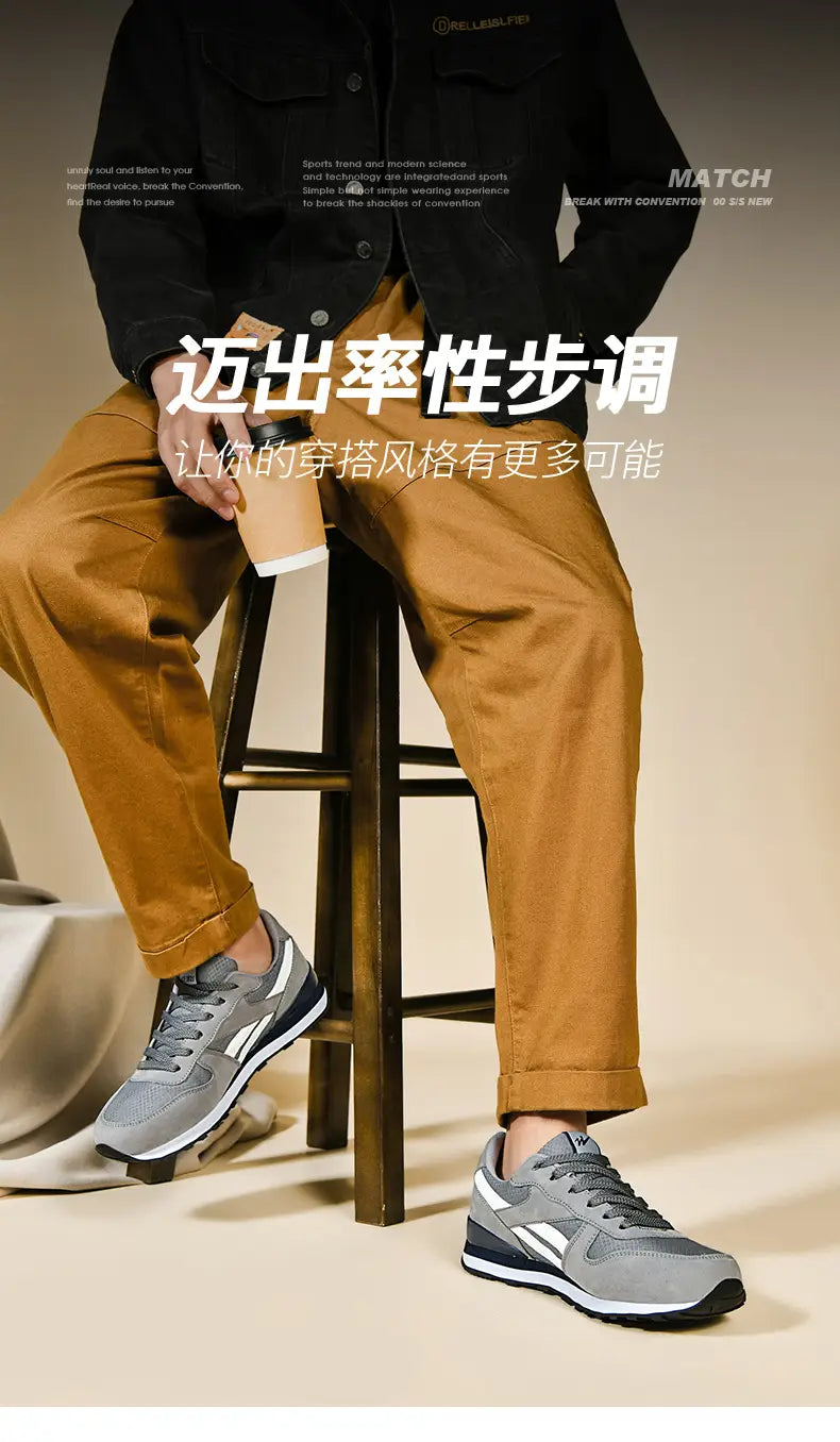 Herrenfreizeitsneaker in Grau und Weiß, Freizeitschuhe zum Gehen, mit schlankem modernem Design und sportlichem Stil.