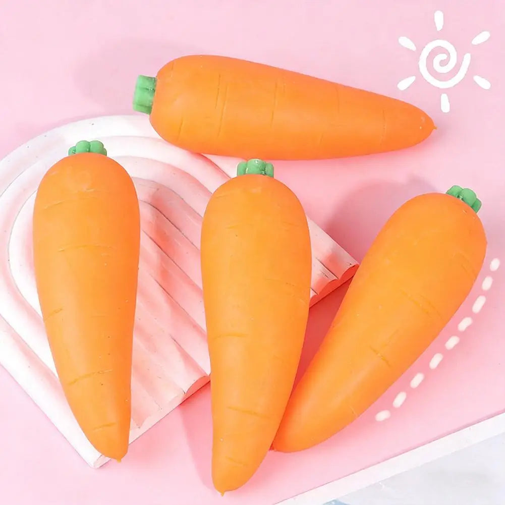Juguetes antiestrés esponjosos en forma de zanahoria de elevación lenta hechos de silicona suave color naranja con tapas verdes, utilizados para aliviar el estrés.