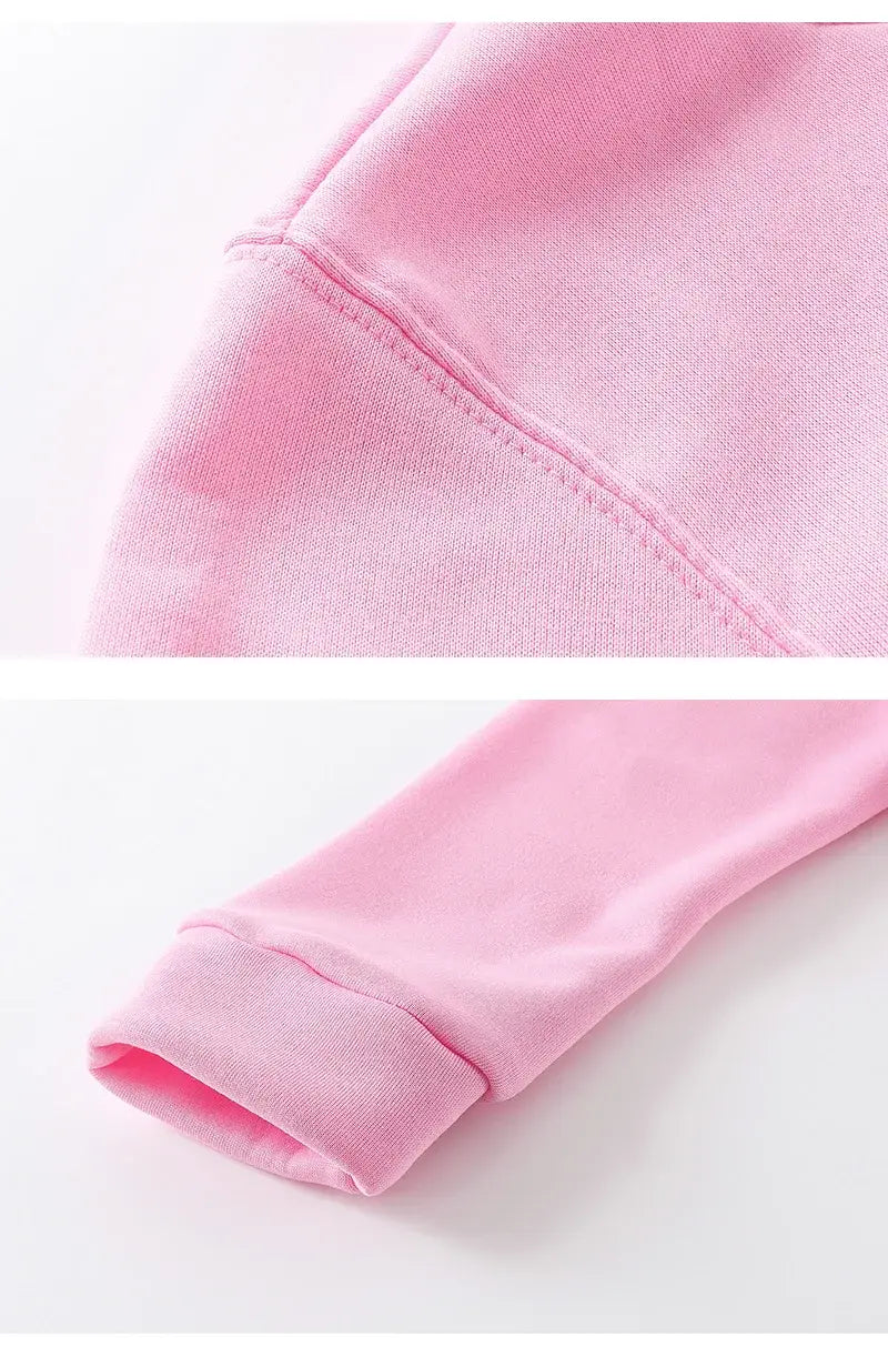 Soft pink cotton Eminem the Eminem Show graphic hoodie with ribbed cuffs and neatly stitched seams.
