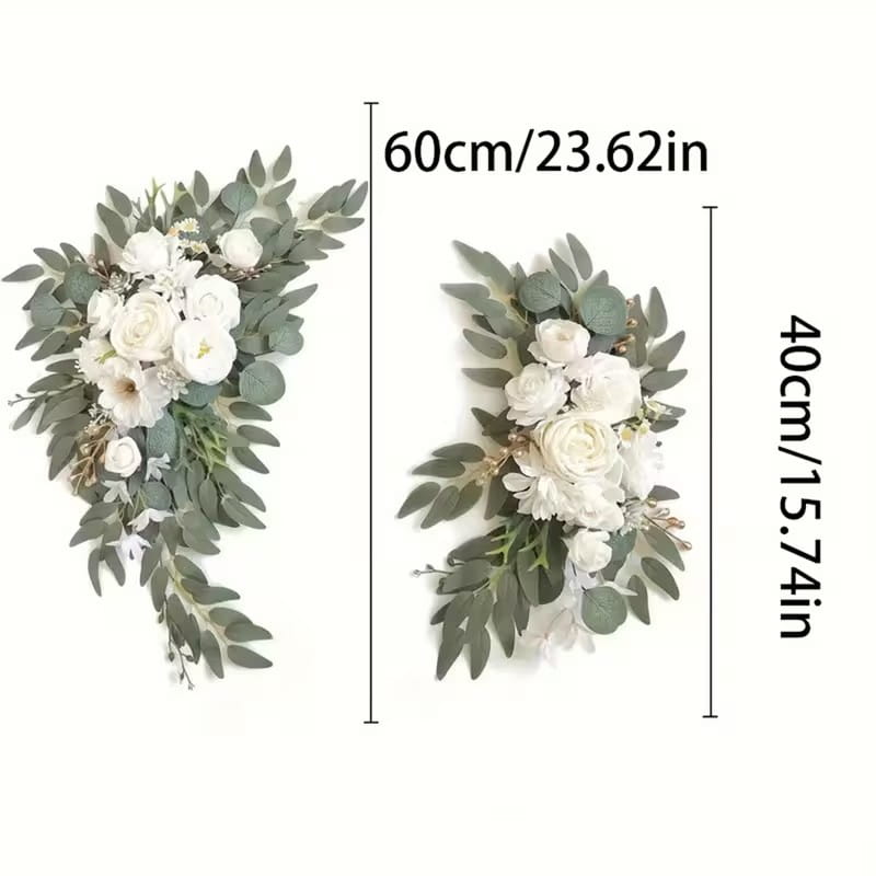 優雅な白いウェディングアーチの造花セット。白いバラとグリーンのユーカリの葉を用いた人工のフローラルリースのアレンジメントを特徴とします。