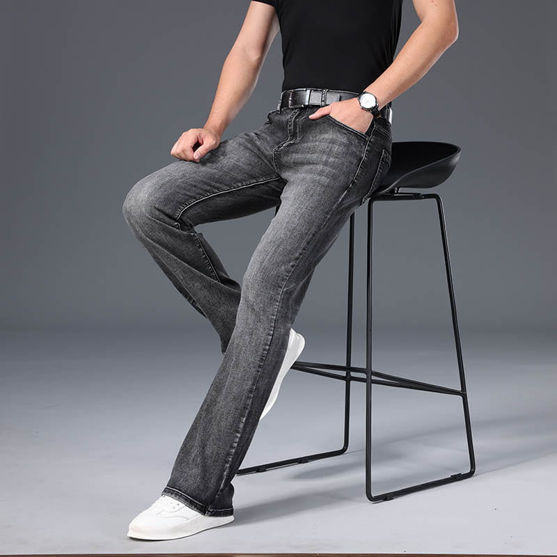 Mens micro flared denim jeans in dark gray with a straight-leg cut and subtle fading made from denim casual pants.