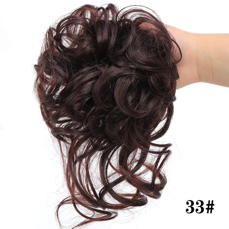A dark brown curly synthetic hair bun scrunchie with a voluminous textured design.