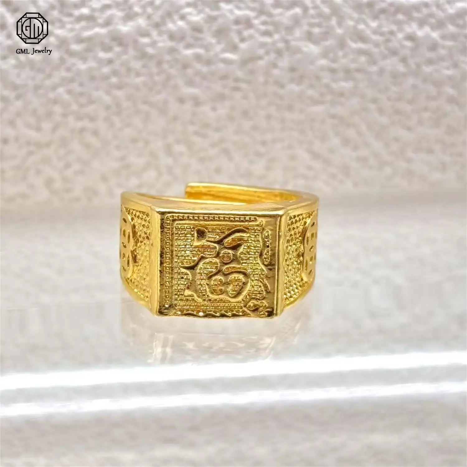 Gold-colored sand gold adjustable ring with matte wide band features intricate engraved Chinese characters and fade resistant textured sides for unisex use.