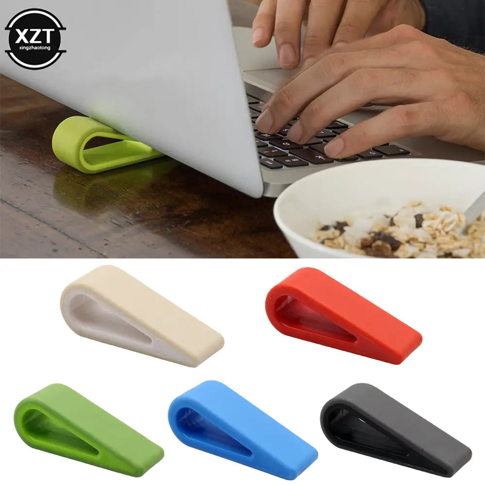 Tope para puerta de silicona verde lima brillante con un diseño flexible y suave que se incorpora en la base de enfriador ergonómico ajustable del soporte para laptop.