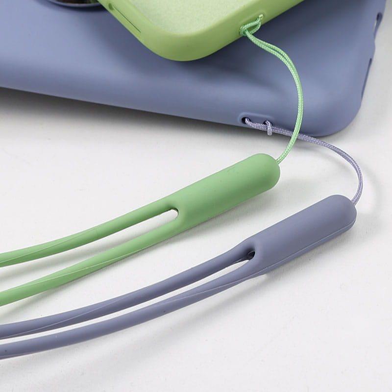 silicone phone wrist strap 2 pack featuring soft silicone material in mint green and lavender with a sleek rounded design and integrated cord loops.