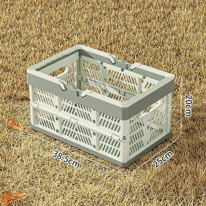 Foldable plastic storage basket in gray and white with a lattice design and collapsible feature for versatile storage.