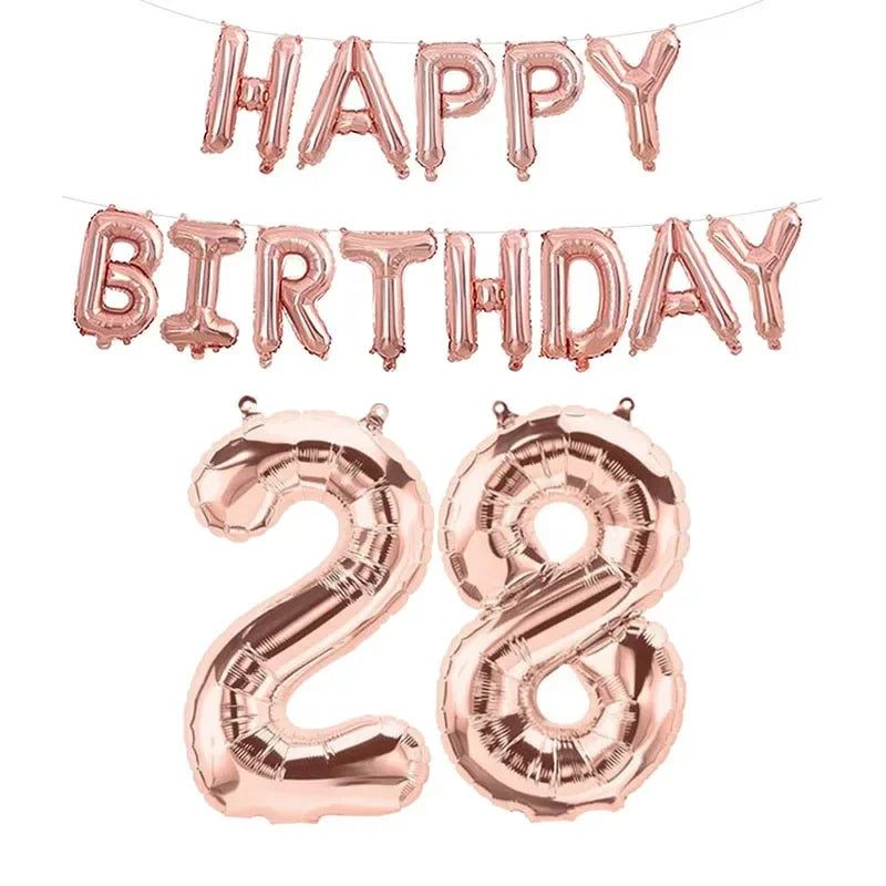 Ensemble de ballons en feuille or rose comprenant une banderole « Joyeux anniversaire » et le numéro 28 pour les célébrations d’anniversaire.