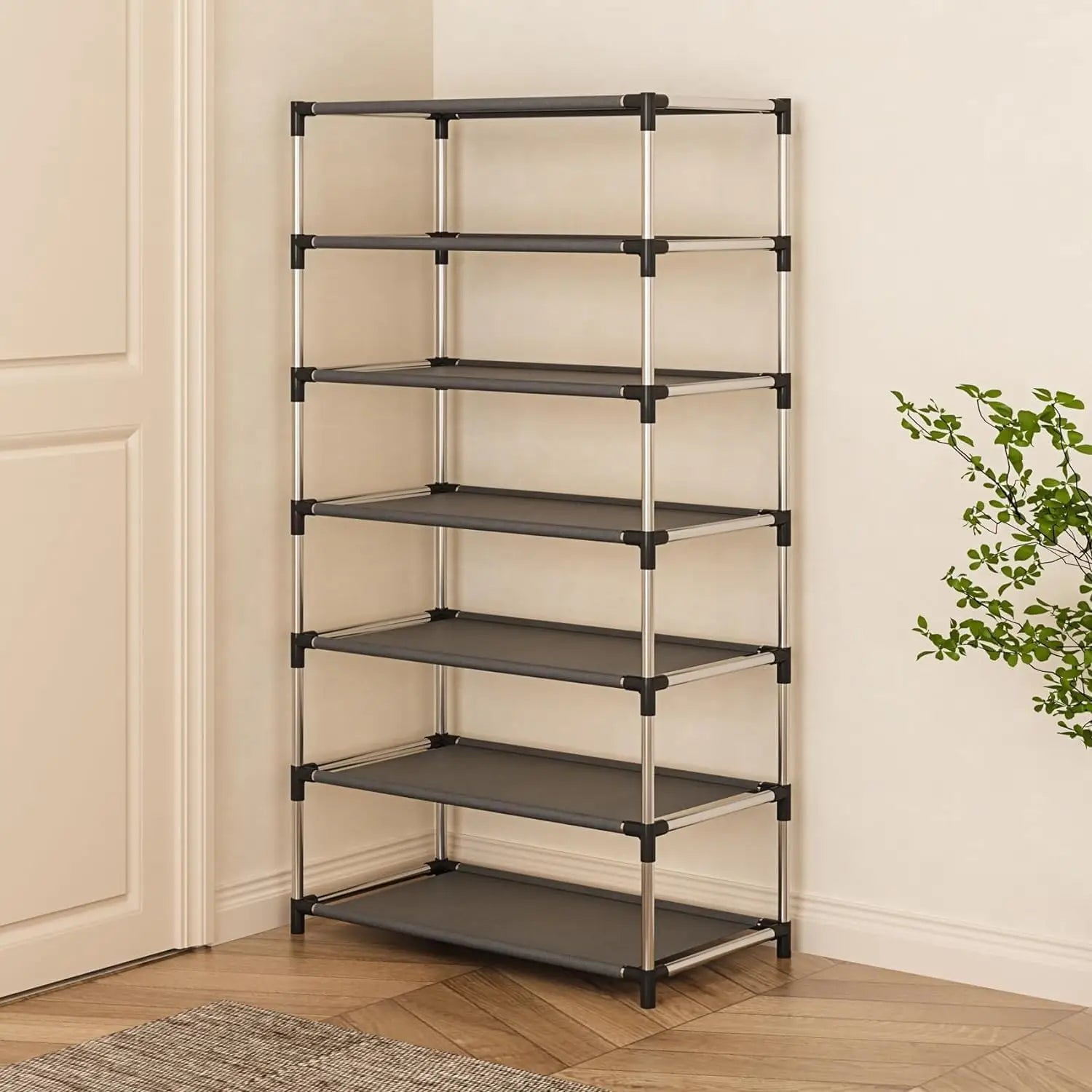 Ein sechsstufiger Metall-Schuhregal-Aufbewahrungsorganisierer, wasserdicht, mit elegantem silbernem Rahmen und dunkelgrauen Stoffböden, ideal für Büro, Eingangsbereich, Wohnheim oder Flur.