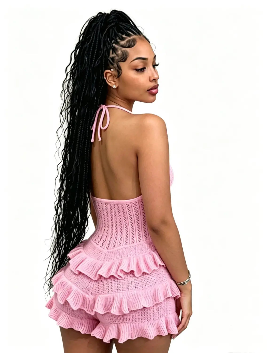 Pink knitted two-piece set with ruffled layers and a halter neckline for summer playsuit.