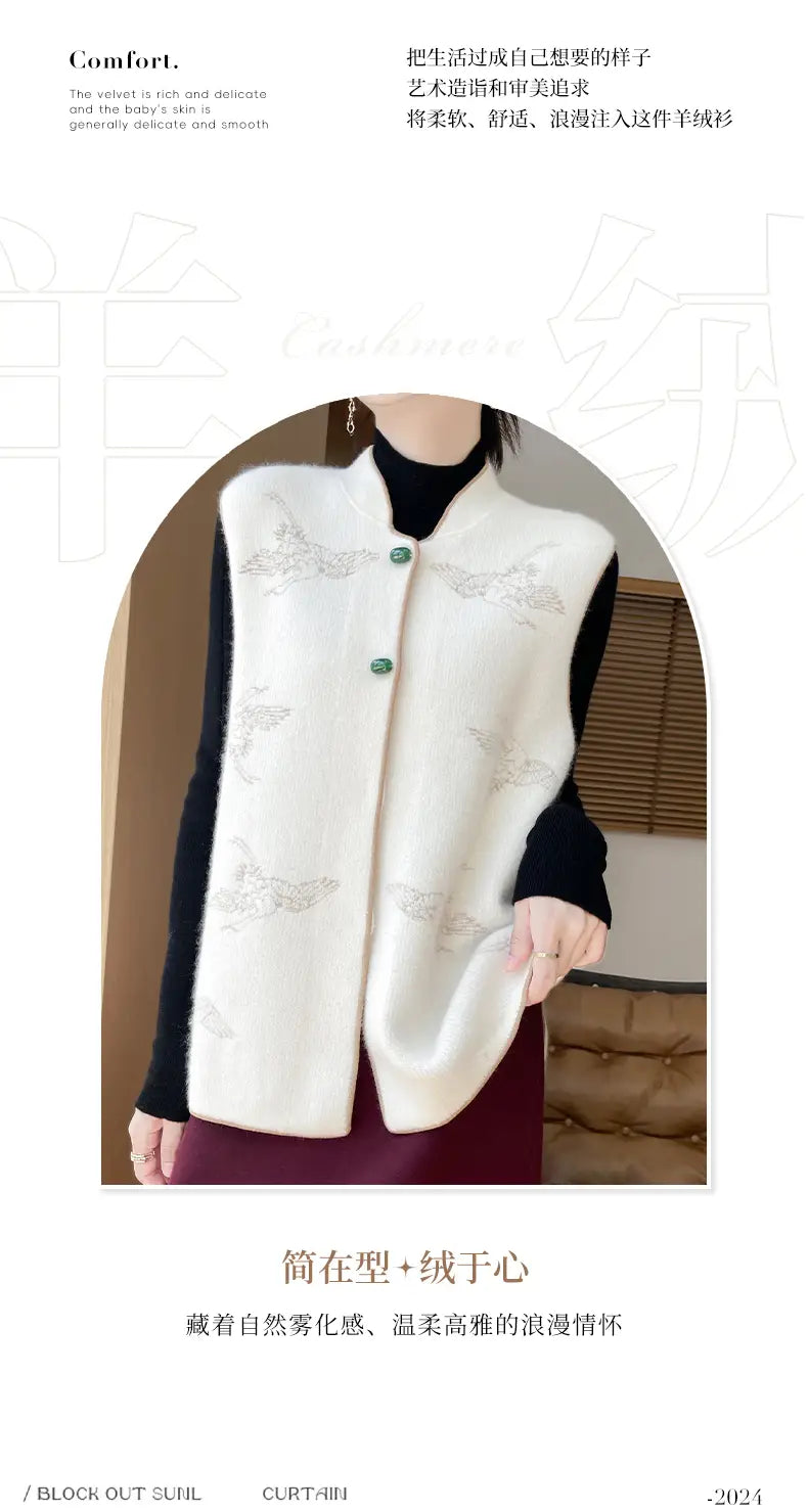 Cream-colored wool embroidered vest for women featuring a softly textured knit fabric with delicate silver embroidery and matching green buttons.