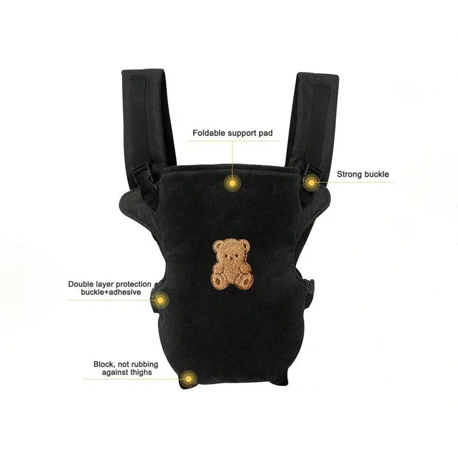 Ergonomischer Babytragegurt 4-in-1 für den Vorder- und Rückentransport in schwarzem Samt mit einem beige bestickten Teddy-Bären-Design.