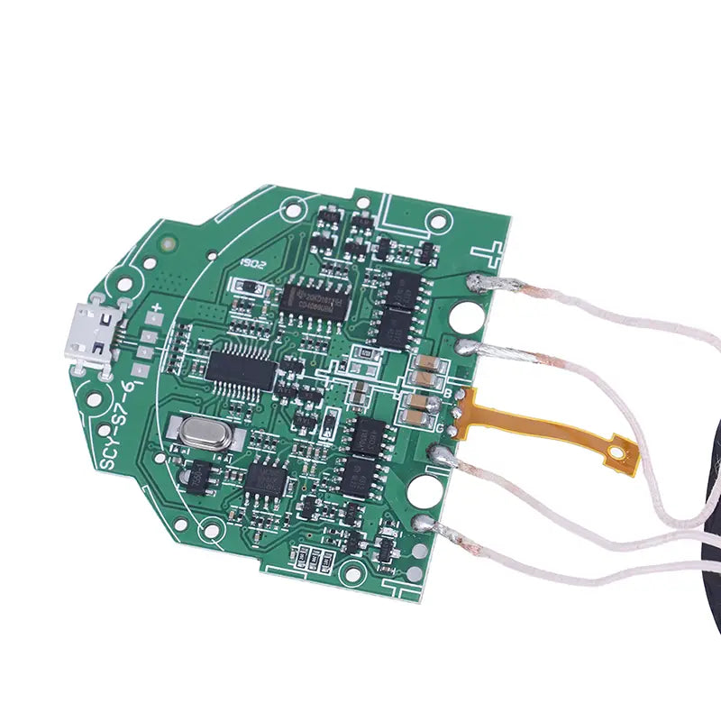 The picture shows a green wireless pcba 15w fast charging transmitter module circuit board with black integrated circuits silver connectors and a usb port on one side designed for 1-2a current.