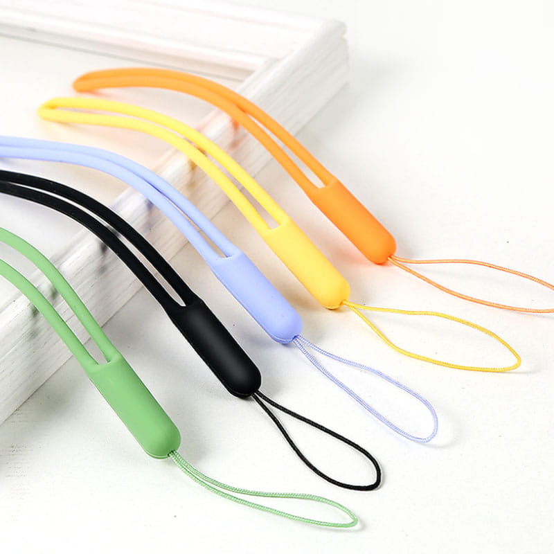Colorful silicone phone wrist strap 2 pack with a smooth flexible design and a small loop at the end for secure attachment.