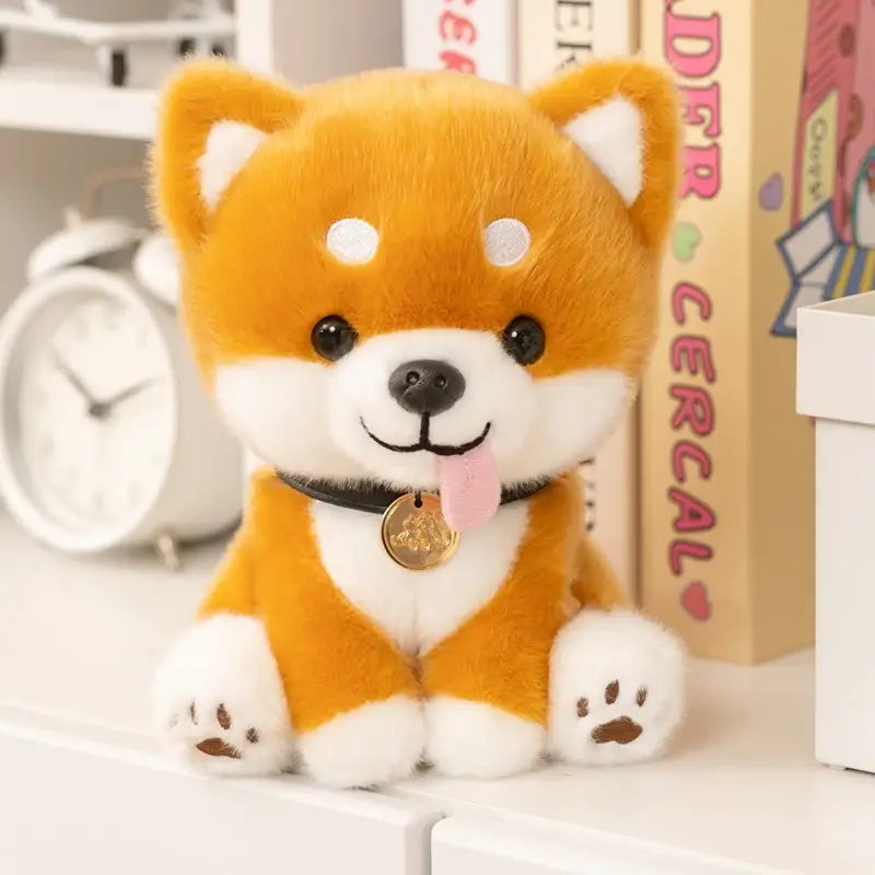 plush shiba inu dog stuffed animal toy featuring an adorable orange and white design with black eyes, a pink tongue sticking out, and a gold-colored tag on its collar.