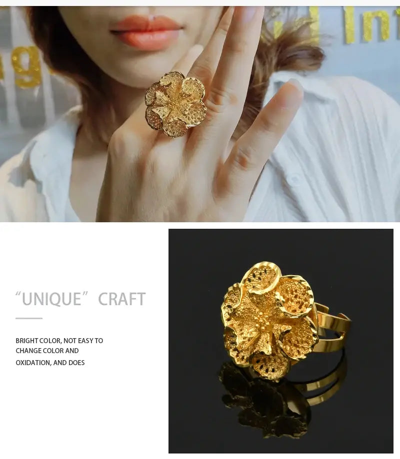 A 24k gold plated dubai jewelry spiral ring for women featuring a golden, intricately crafted flower-shaped design with detailed filigree work.