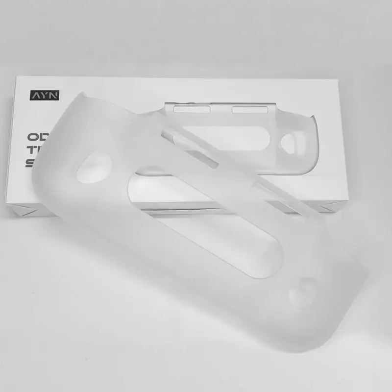 Translucent white silicone tpu grip protective shell and case for ayn odin 3 with precise cutouts for buttons and camera shown from the back side.