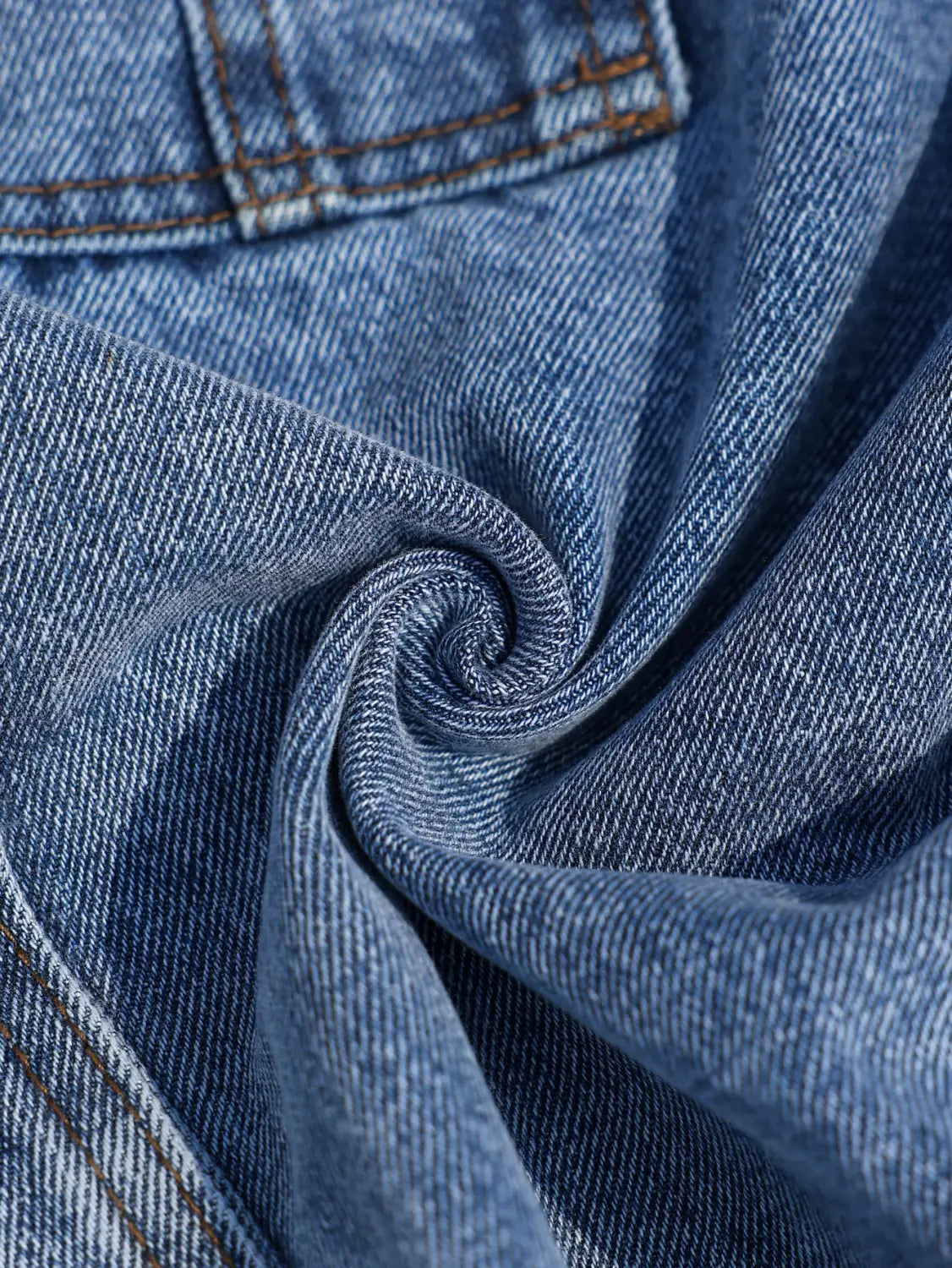 Men blue denim cargo shorts regular fit showing medium wash blue denim fabric with classic twill weave and brown stitching.