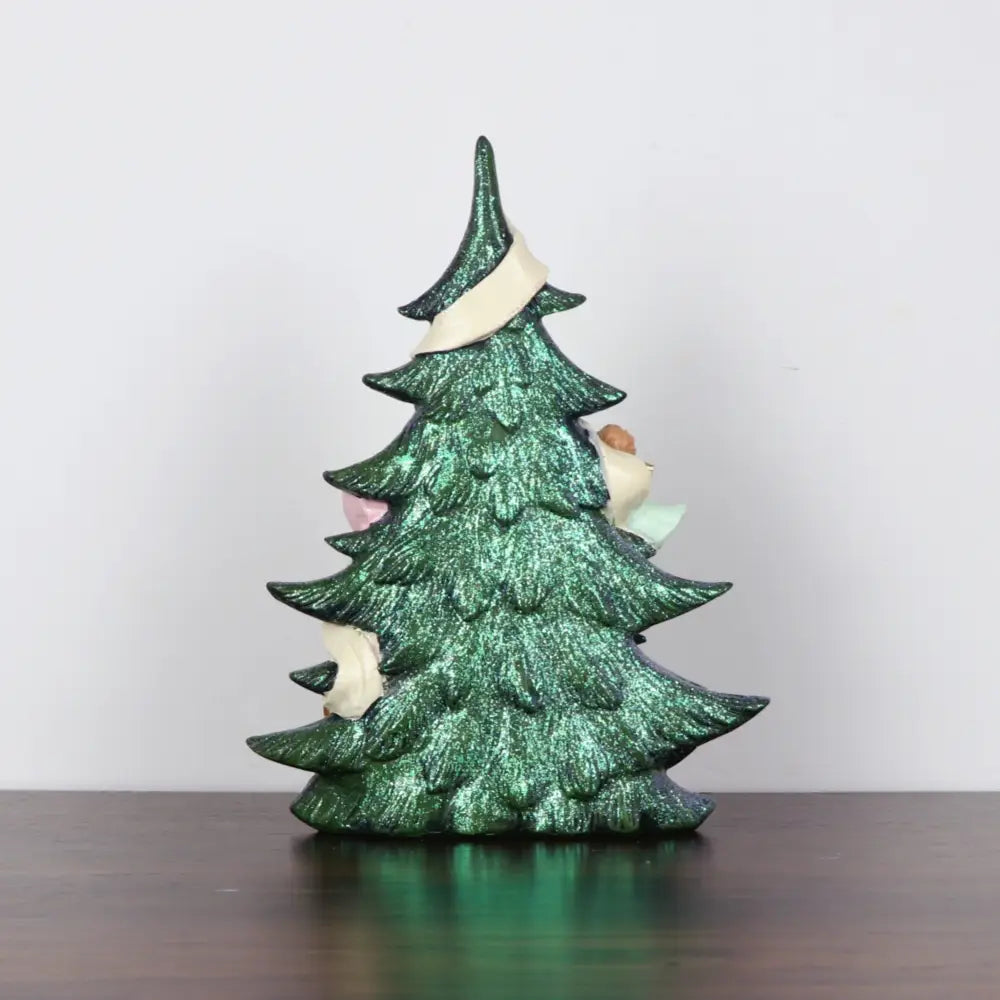 Glitzernder Engel-Weihnachtsbaum aus Harz – mit einem glitzernden grünen Harzbaum; um den Stamm ist eine cremefarbene Schleife gewickelt, und kleine dekorative Elemente schauen seitlich hervor.