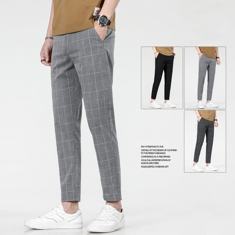 Pantalon de costume d’affaires pour homme en soie glacée à carreaux gris, coupe ajustée, au design moderne et sur mesure, adapté à un usage décontracté.
