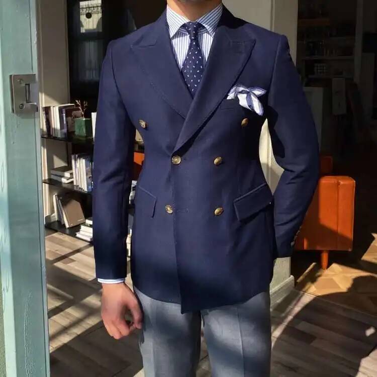 Heced582b51c143d4a87000366cf87b96v.jpg Navy blue double breasted slim fit blazer jacket with gold buttons and a patterned pocket square for men.
