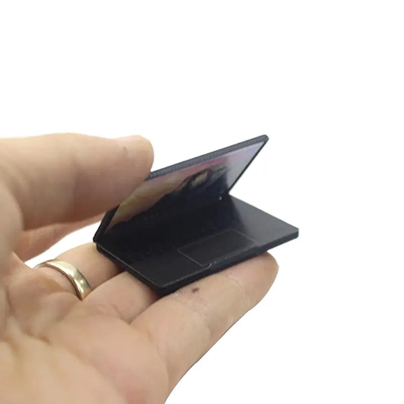 black miniature mini laptop doll house accessory with glossy finish and foldable screen made of alloy