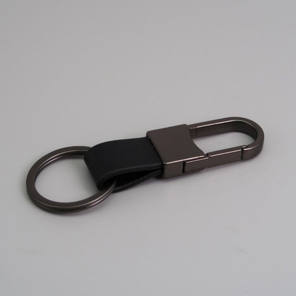 Black leather keychain with a matte-finished metal carabiner and ring designed as an anti lost waist ring.