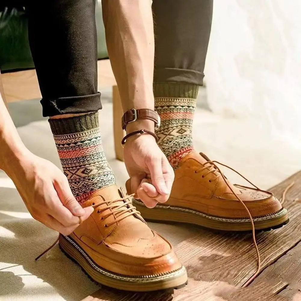 tan leather brogue shoes with chunky sole and decorative perforations paired with men retro cotton crew socks mid-high tube thermal teal showcasing a fashion trend combination.