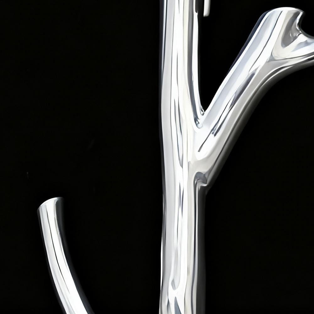 silver tree branch brooch pin featuring a shiny silver metallic coat rack design with a sleek branch-like structure for fashionable corsage use