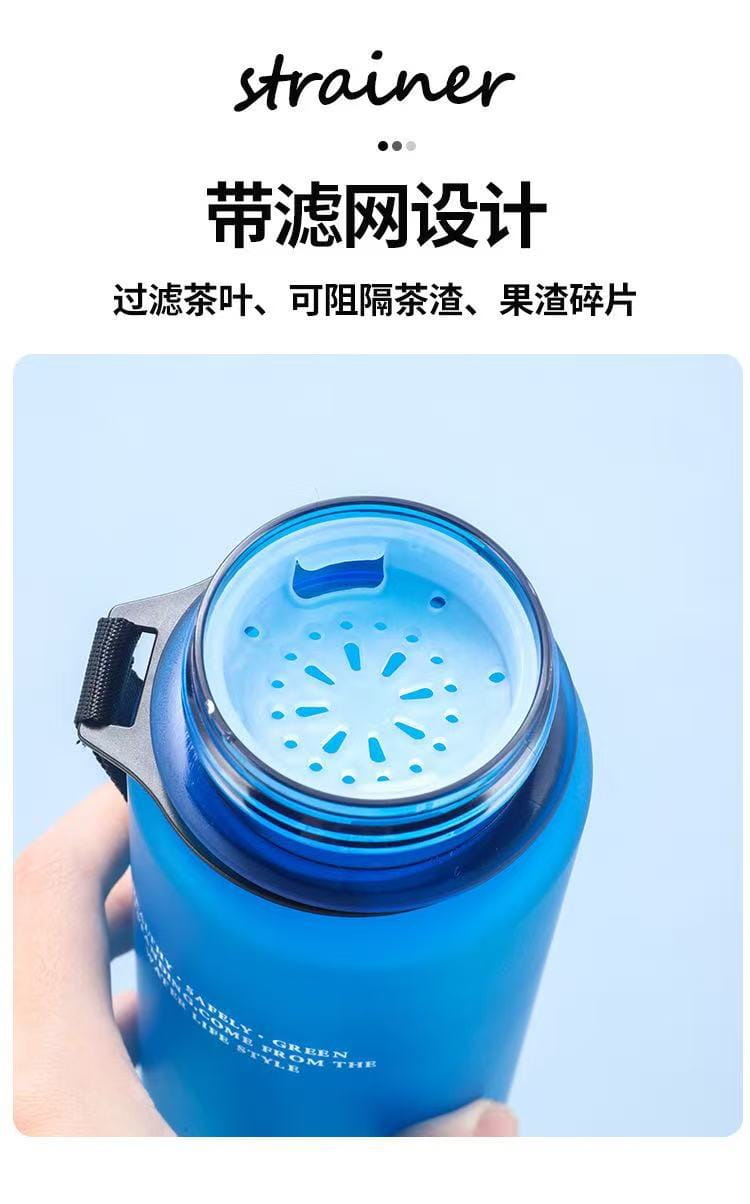 Digital Circus water bottle 650ml red with blue translucent body and built-in strainer lid for filtering tea leaves and fruit pulp.