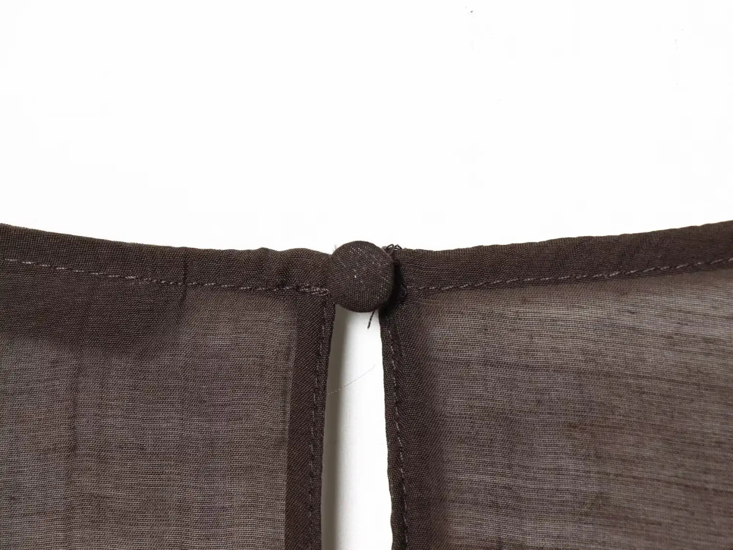 dark brown chiffon flare sleeve blouse with subtle textured fabric and matching button detail centered on seam showcasing sleeve style