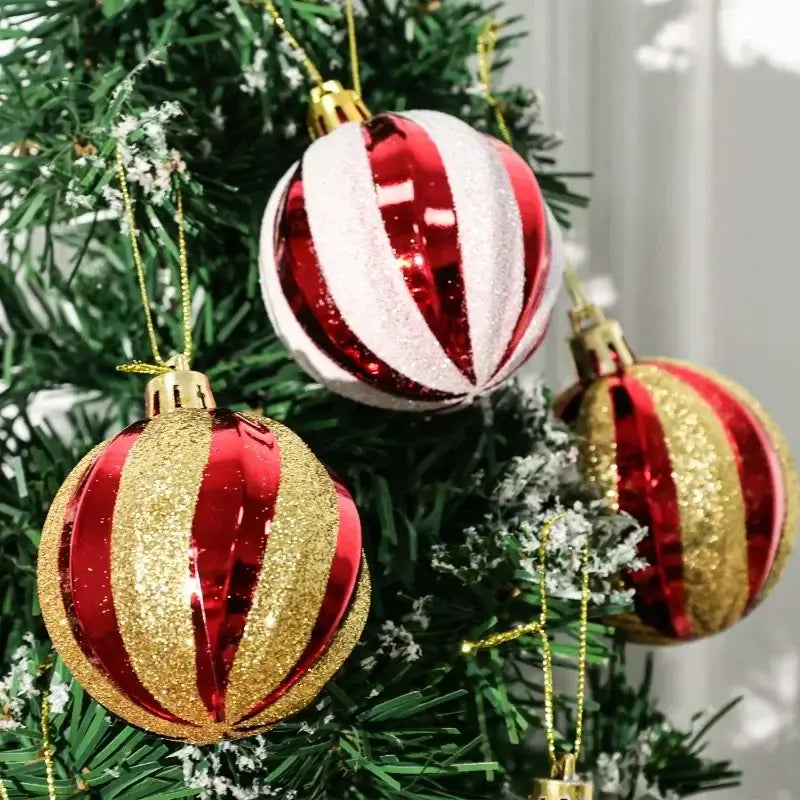 Christmas ball ornaments featuring red and white striped christmas tree ornaments with glittery gold accents in a 6cm set of six.