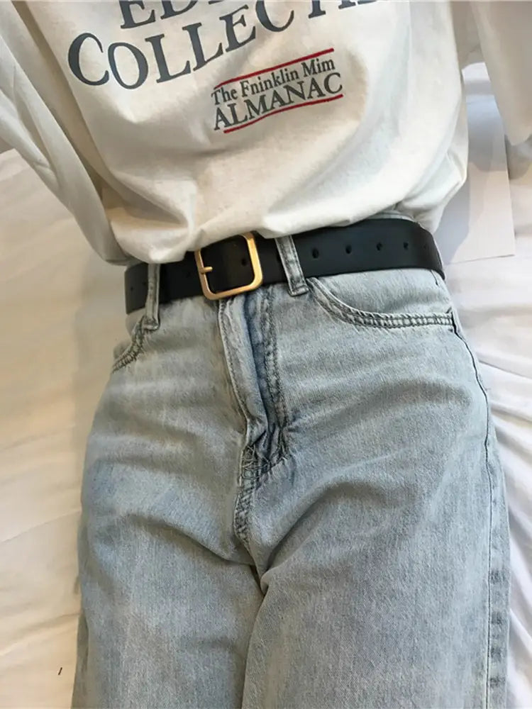 Black leather women leather belt with a gold-toned rectangular buckle casual fashion waist strap.